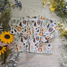 Load image into Gallery viewer, Christmas prints Oversized Ozzie tee