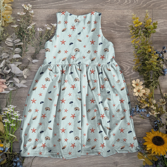 Shells blue and yellow pinafore dress