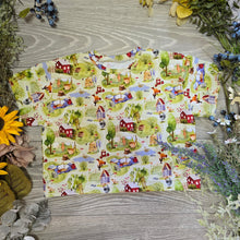 Load image into Gallery viewer, Christmas prints Oversized Ozzie tee
