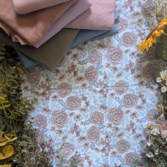 In stock - white subtle floral jersey - Sunshine and Raebows