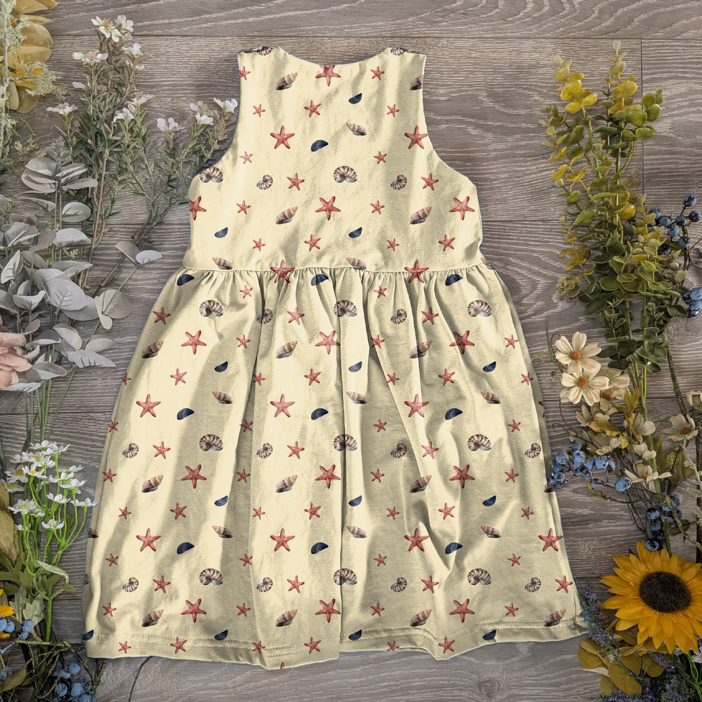 Shells blue and yellow pinafore dress
