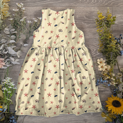 Shells blue and yellow pinafore dress